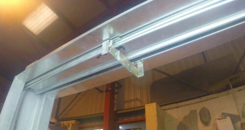 Fusible link in place within a fire damper