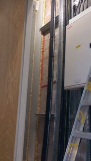 Kimpton Electrical team installing Riser cable