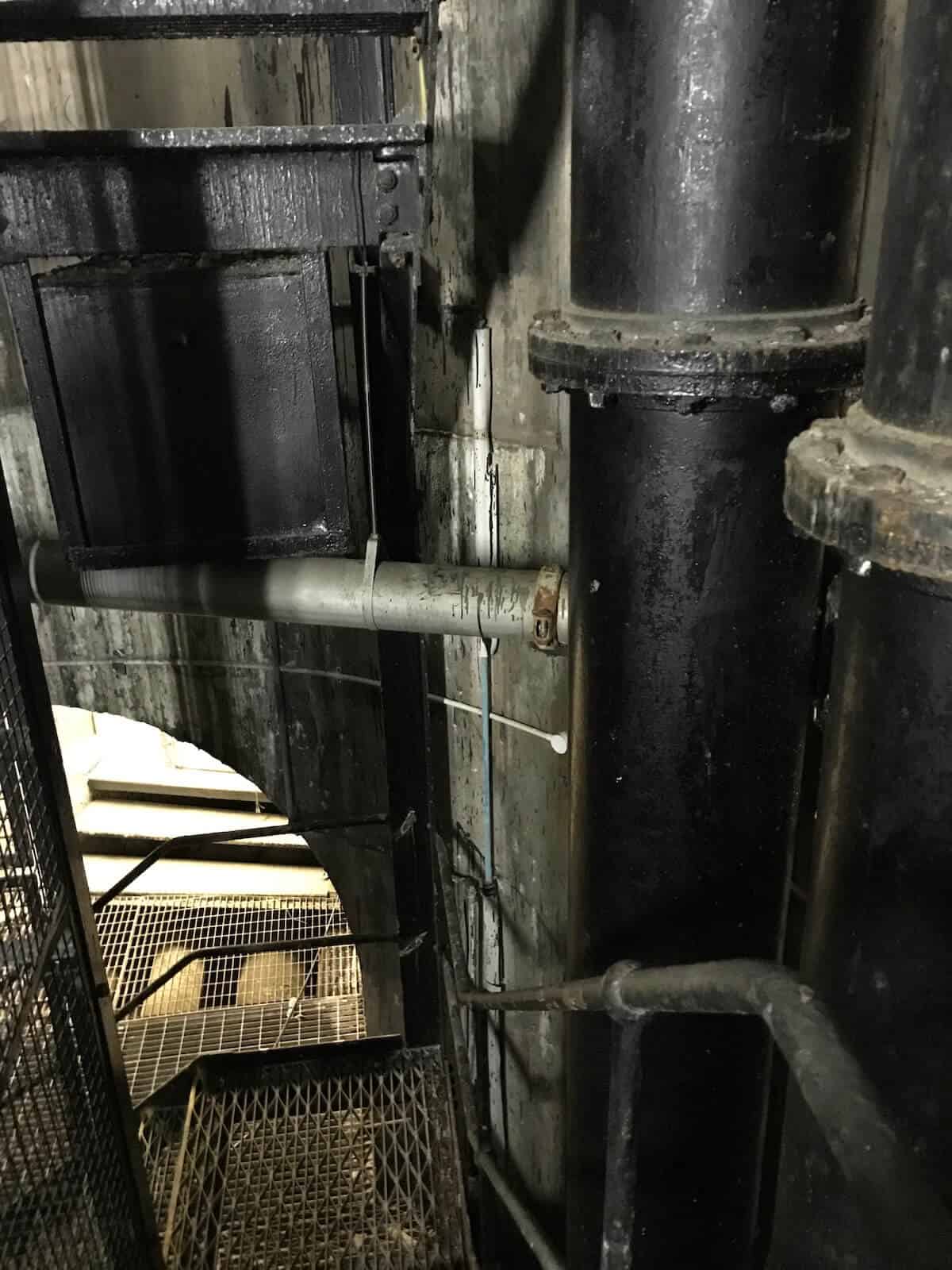 Part of the stairwell which carries the stairs and a 40m riser for the waste water pipework within the Kingsway Tunnel complex