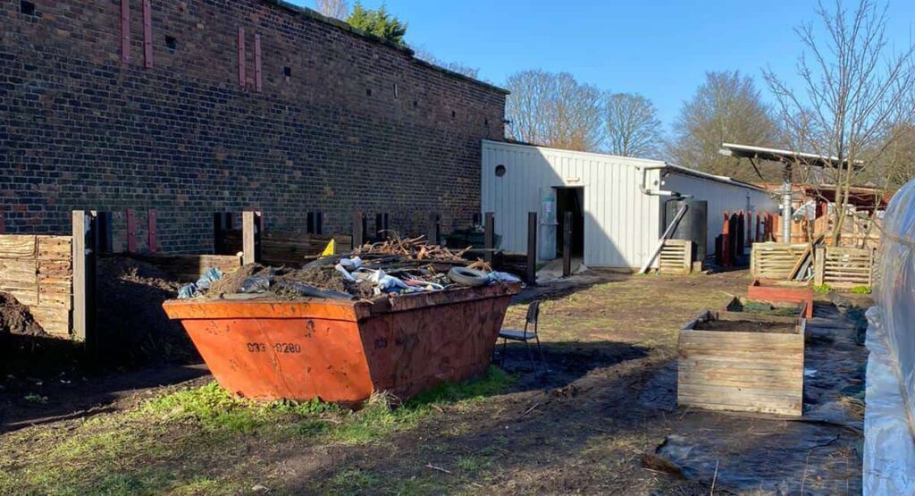 The skip is filled with all of the scrap stripped out