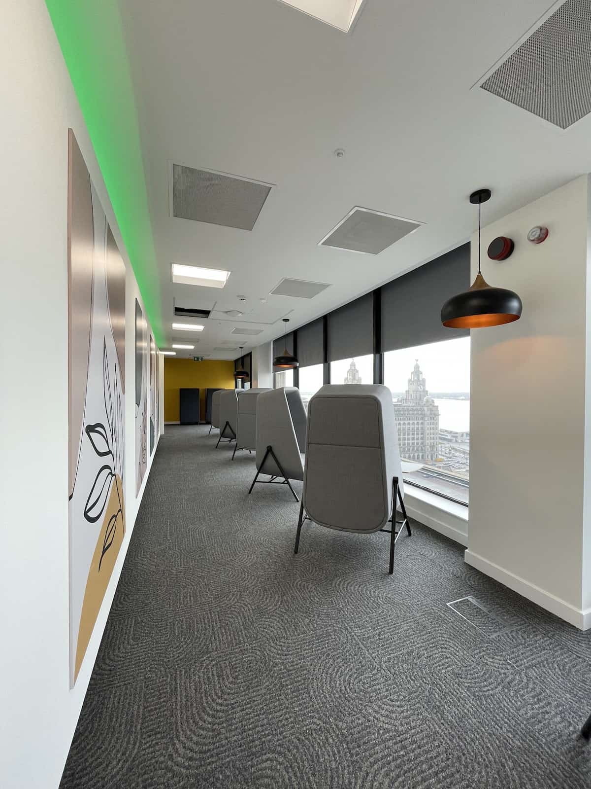 Alternative view of individual desk pods at Capital Building floor 9 by Kimpton