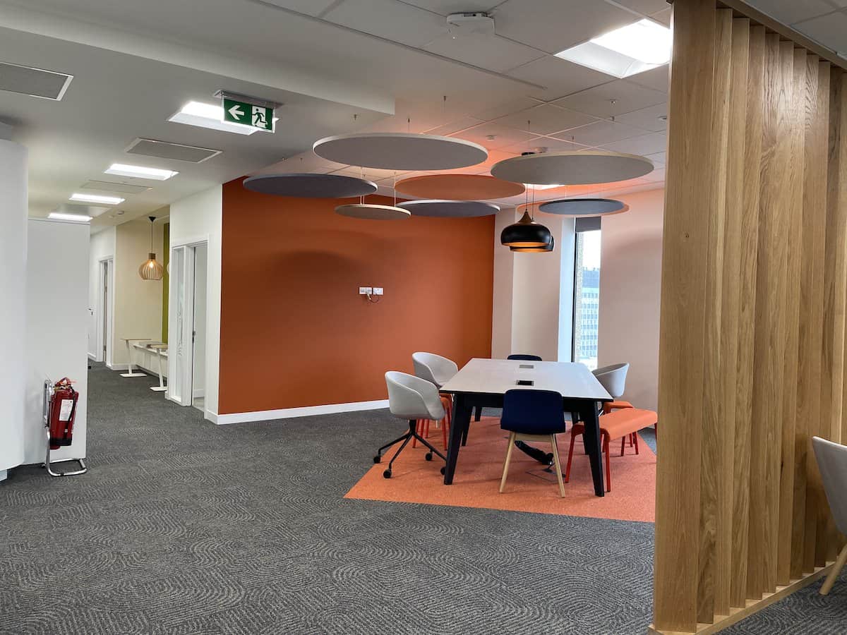 Open meeting space inside Capital Building floor 9 with fit out and HVAC by Kimpton