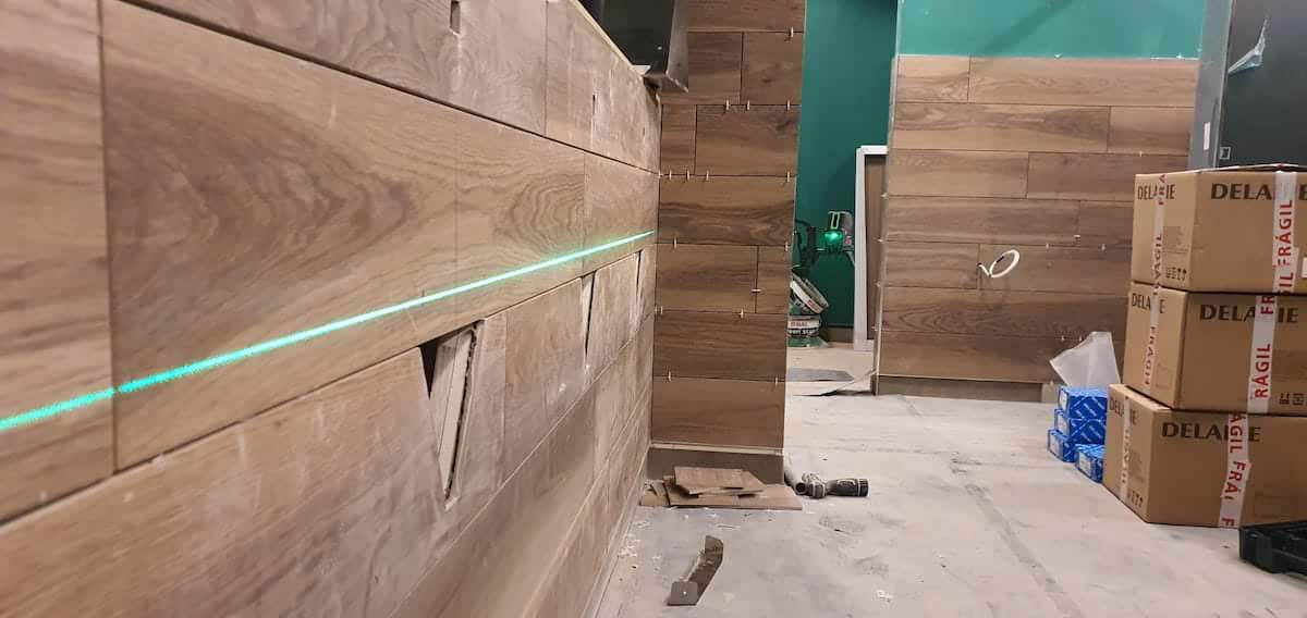 Rear wall detail within toilets at Im a Celebrity Jungle Challenge with plumbing by Kimpton