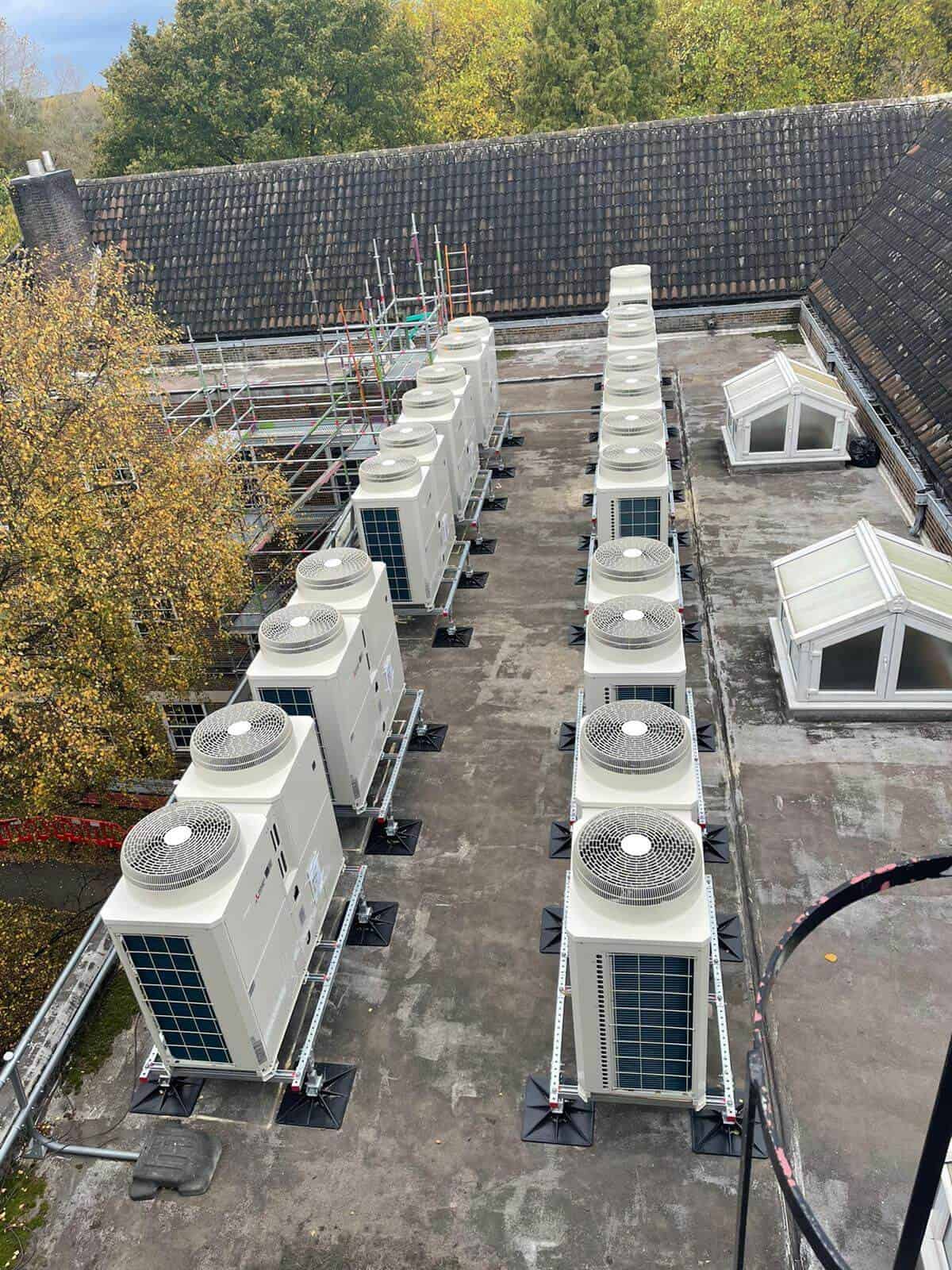 Roof mounted heat pump units installed ready for pipework