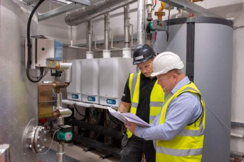 Final inspection by the Kimpton team in the Plant room at Bailey Fields Sheffield