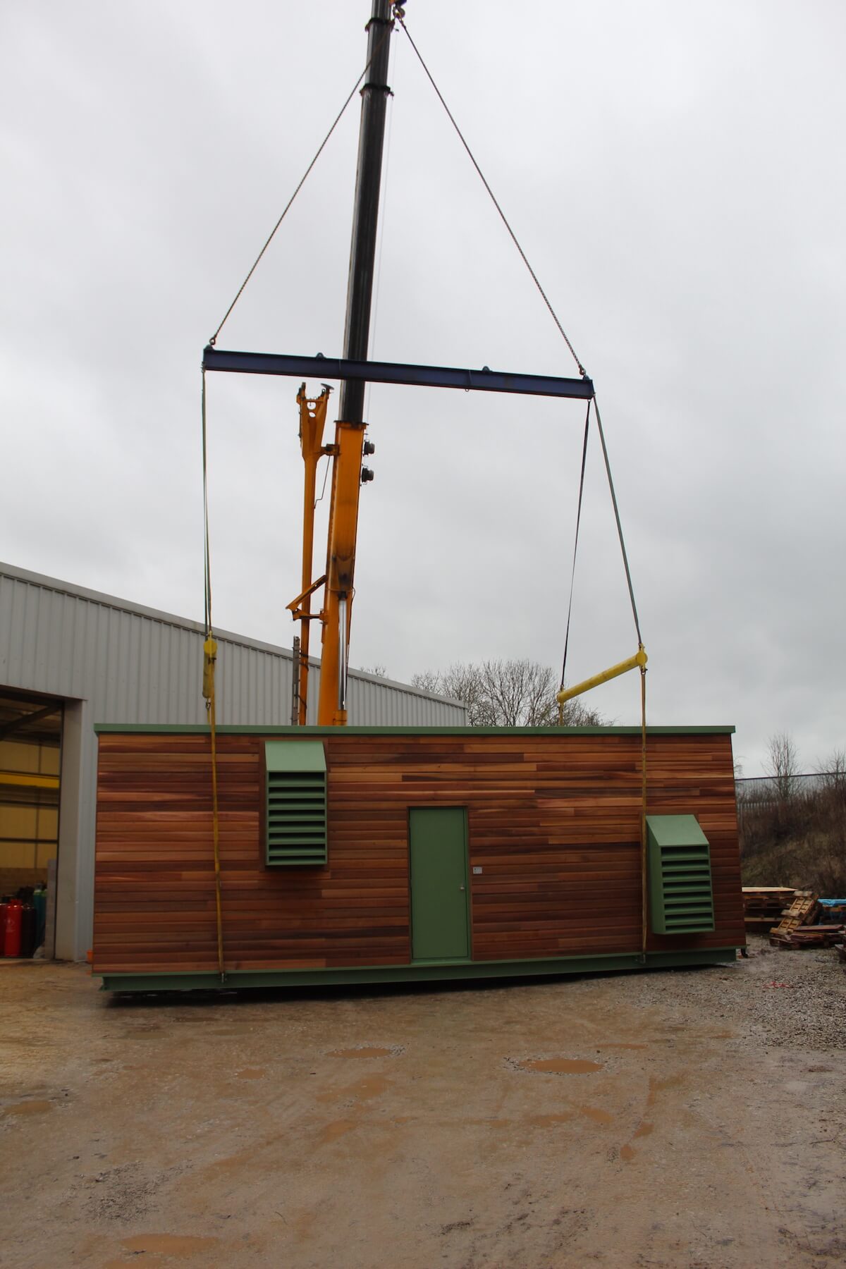 2 The acoustic plant room is craned out of the factory ready for loading