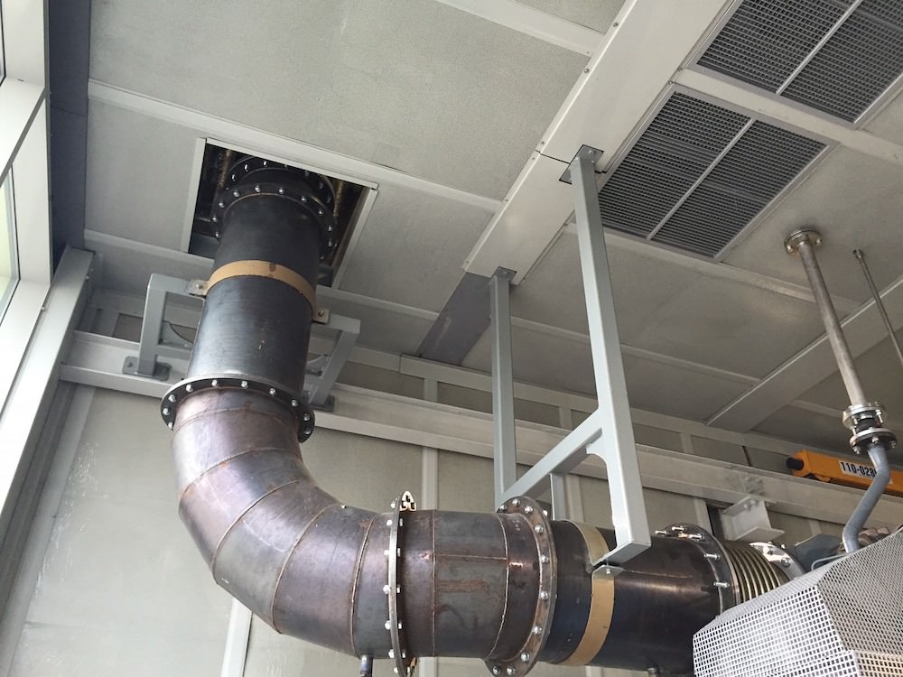 6 Huge pipe flows up through the ceiling