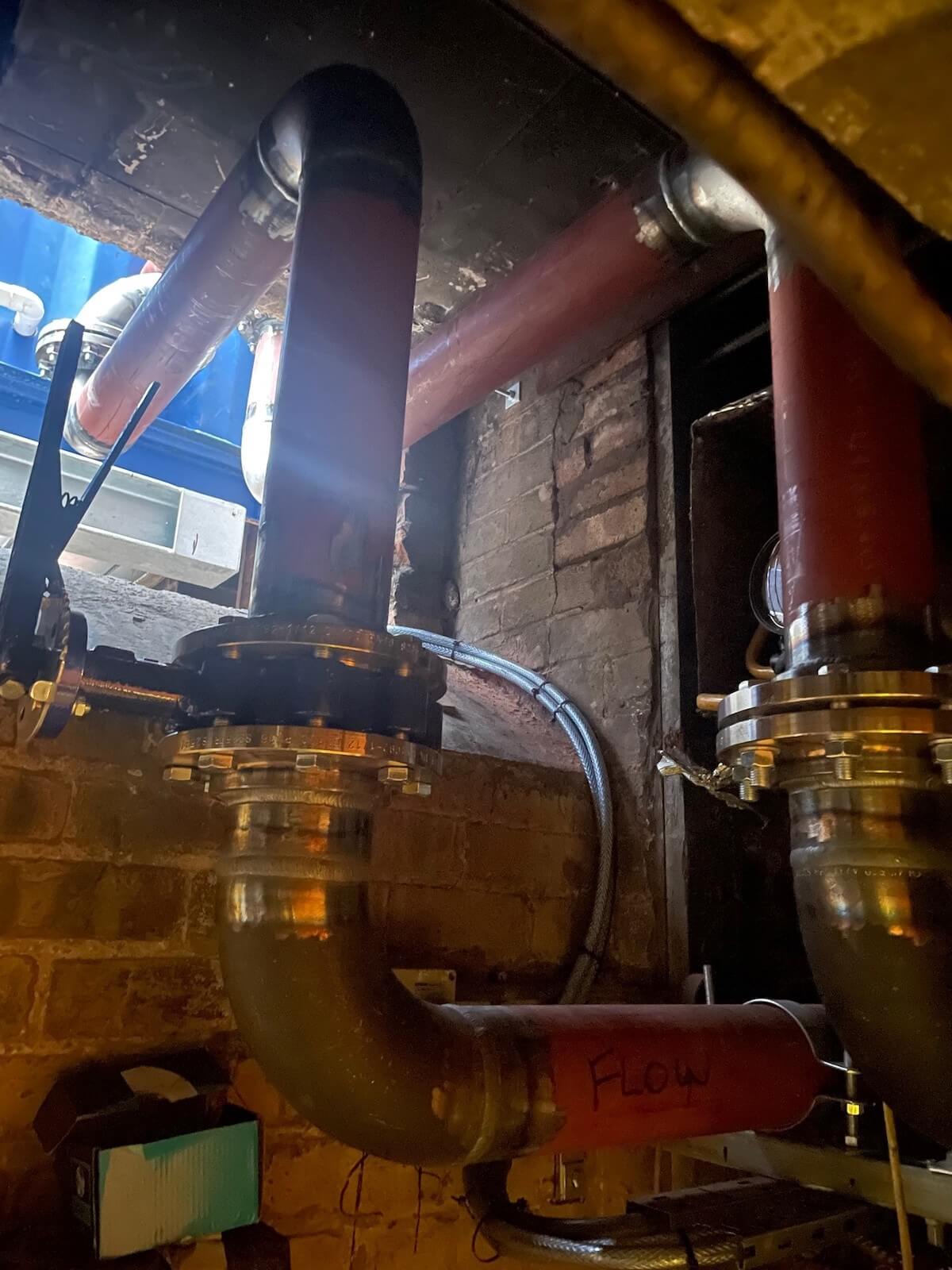 Completed connections from the new packaged plant room into the existing basement plant room