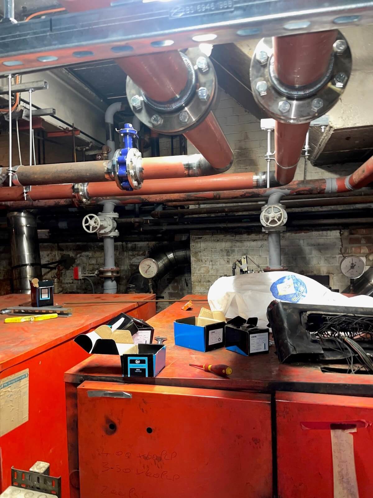 Old boilers against new pipework in place