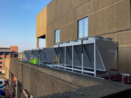 Working outside to install three new temporary dry air coolers