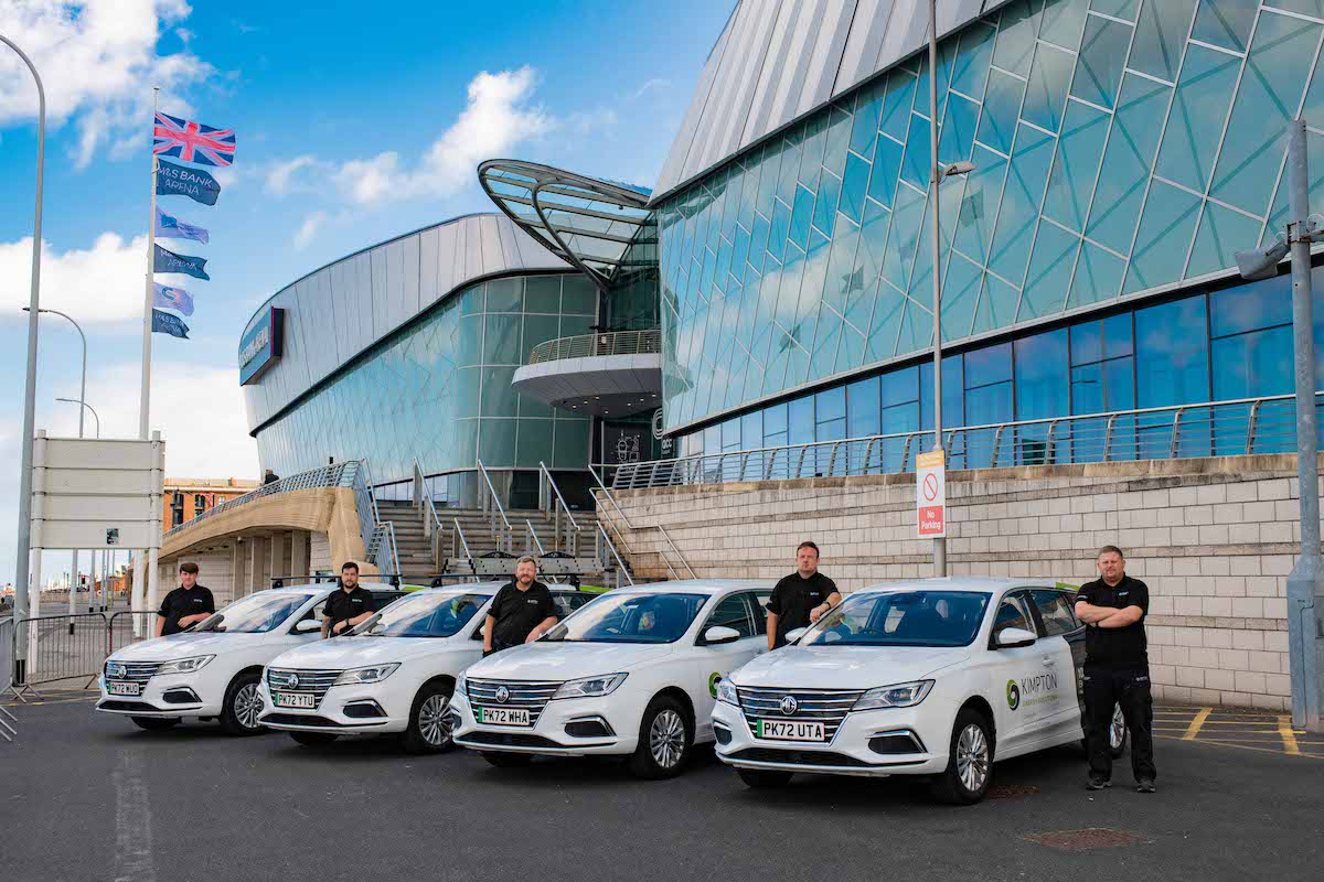 Some of the Kimpton Engineers in their electric vehicles at the ACC Arena