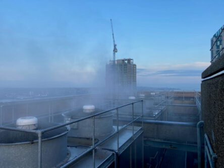 On the very top of the building you can see the cooling system at work