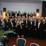 The whole Kimpton team celebrate 60 years in business together