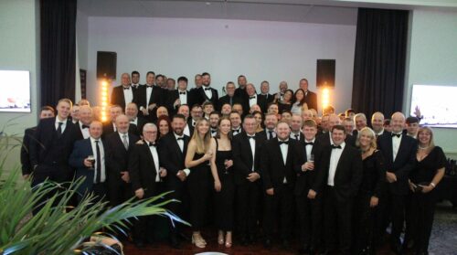 The whole Kimpton team celebrate 60 years in business together