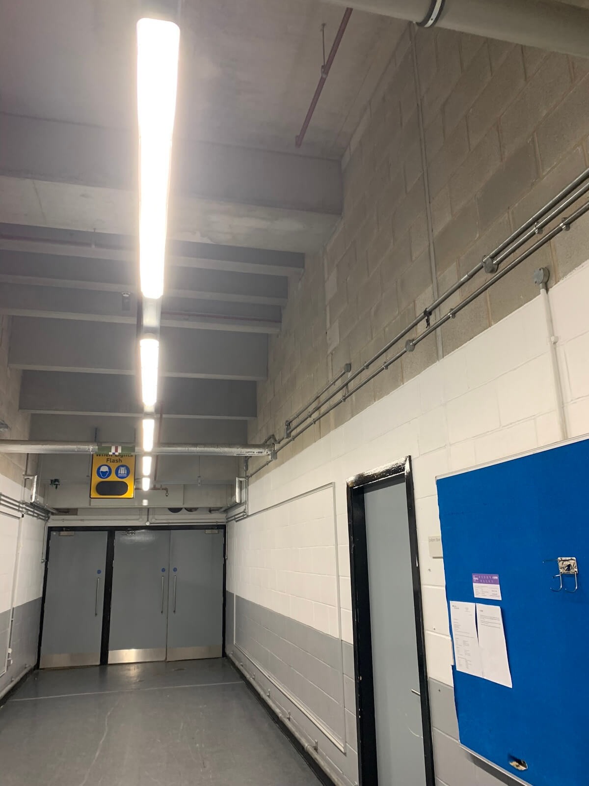 The wall before it was cut through to incorporate a roller shutter