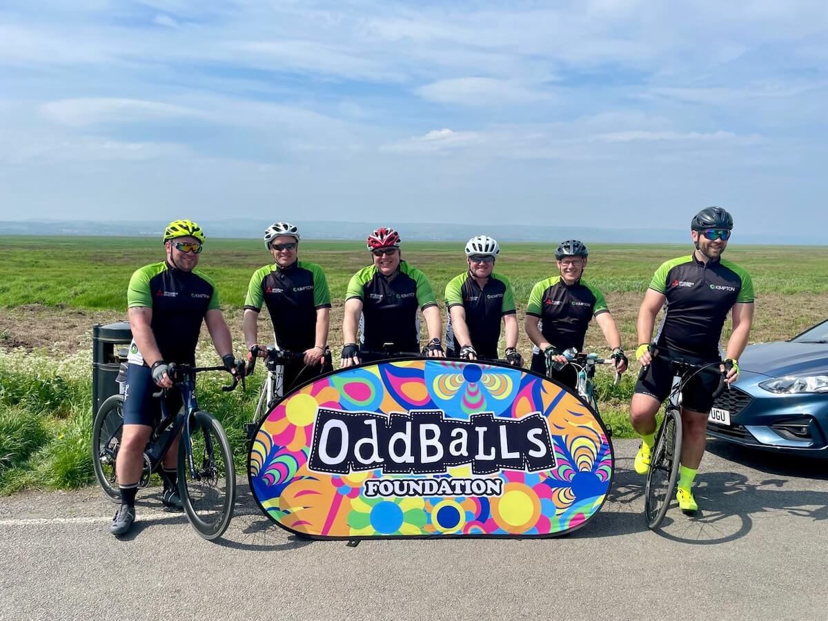 Posing at park gate Kimpton team on the Oddballs 60 mile bike ride