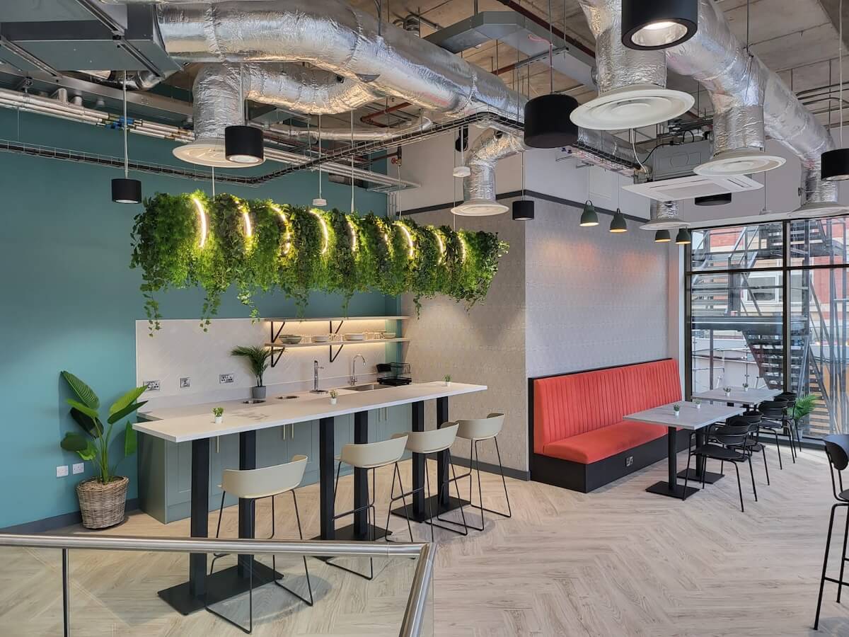 Decorative LED rope lighting over desk as common area feature
