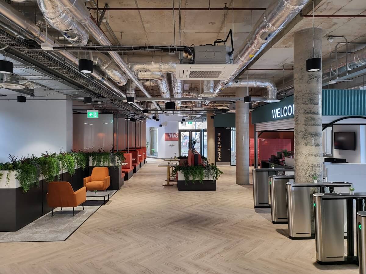 reception controlled speed gates to right with Emergency Lighting visible reception controlled speed gates to right with Emergency Lighting visible