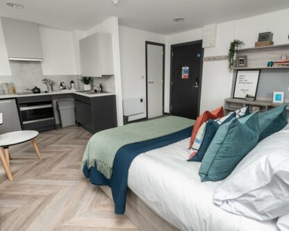 PBSA and BTR refurbishment - Studio bedroom with kitchen at Steelworks Sheffield PBSA with mechanical services by Kimpton