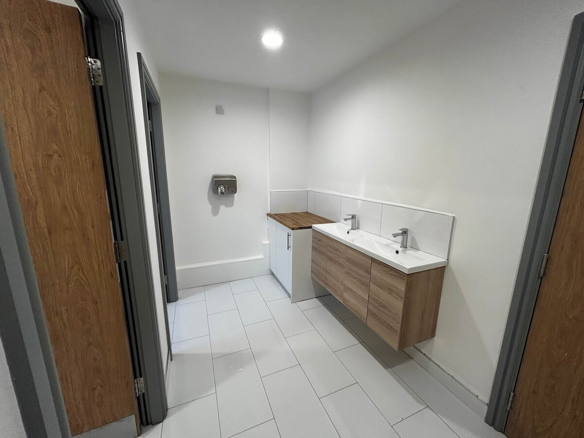 Bathroom fit out within Warrant House with Cat A and Cat B fit out by Kimpton