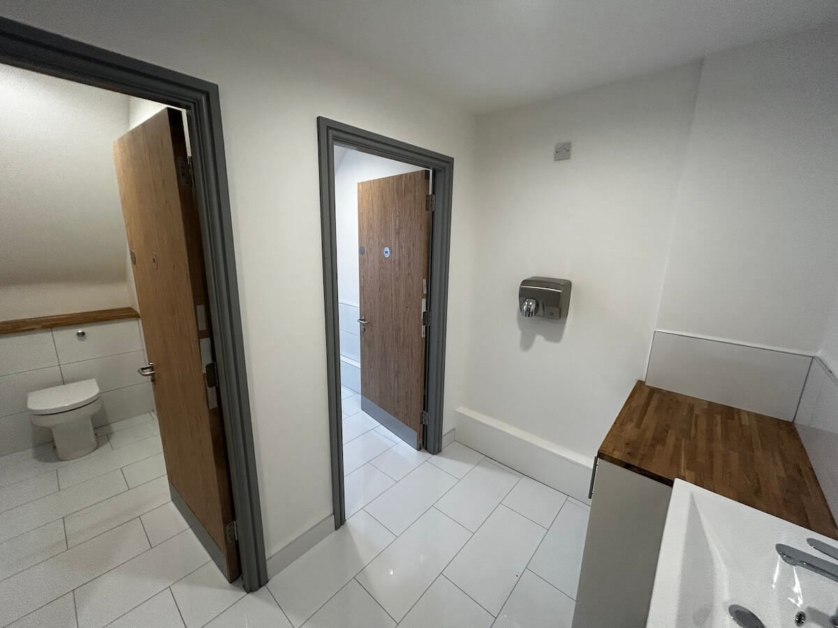 Second view of bathroom fit out of Warrant House with Cat A and Cat B fit out by Kimpton