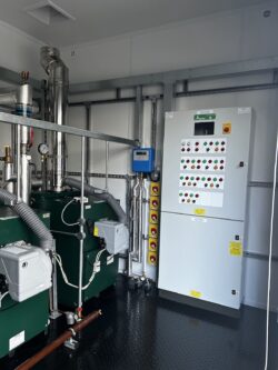 The main control panel within the Packaged Plant Room for Welburn Hall School North Yorkshire