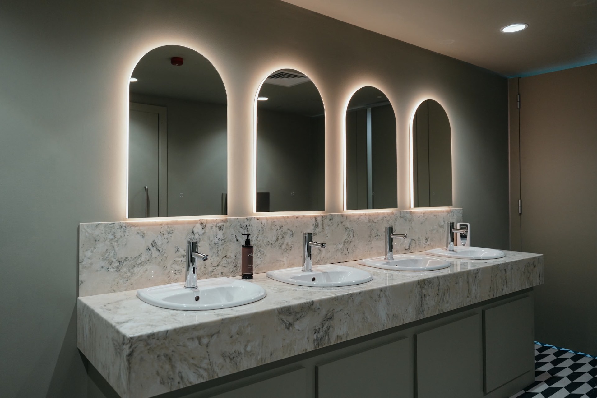 The bathrooms in The Skyline Suite Experience at The M and S Bank Arena with fit out by Kimpton